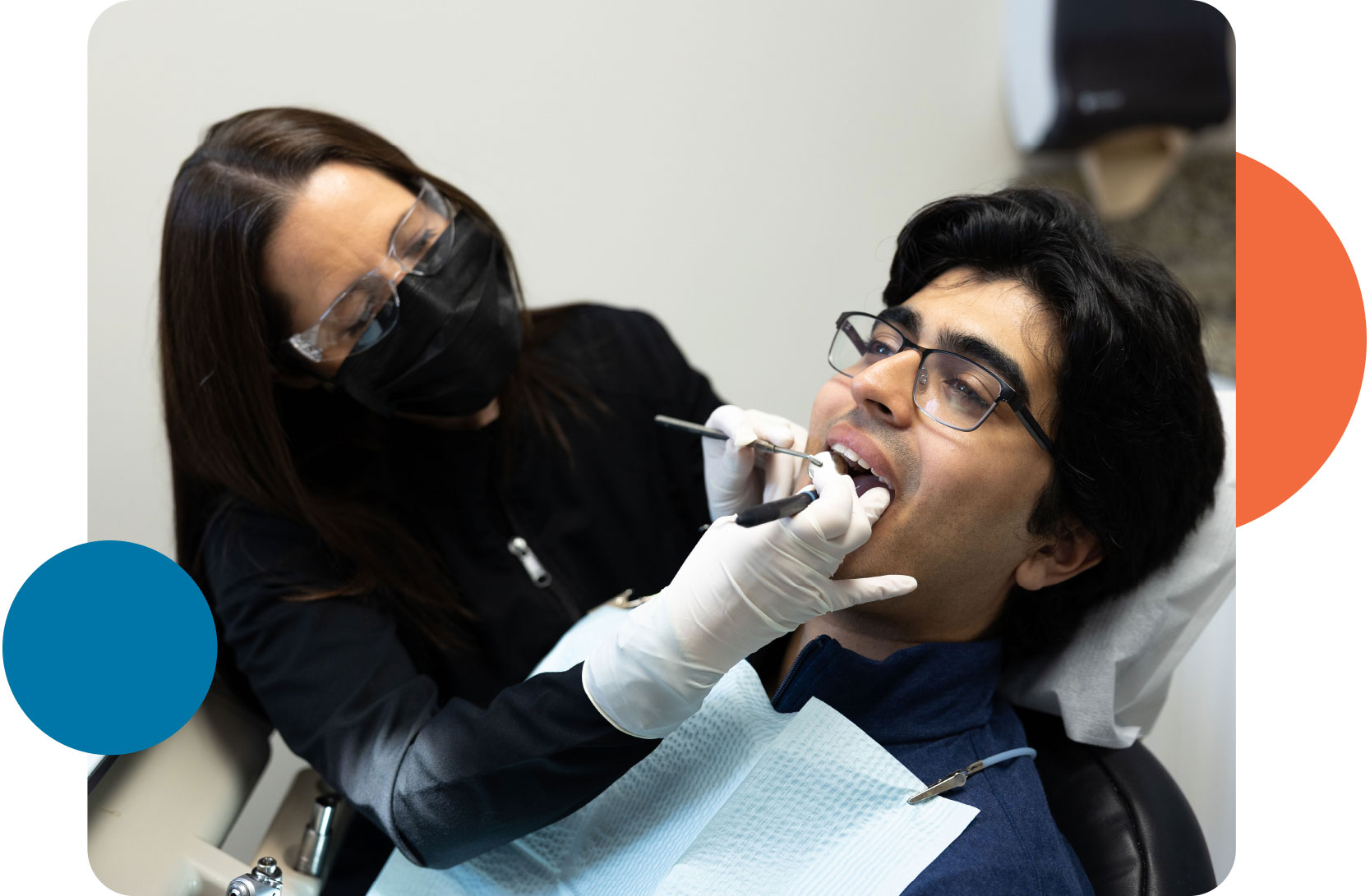 Dental professional treating a patient during a restorative dentistry appointment