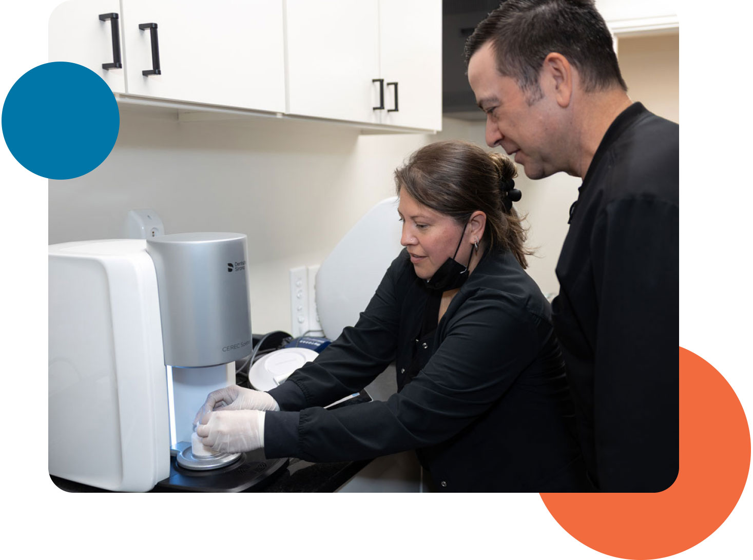Dr. Joel Hayden and dental team member using CEREC same-day crown technology